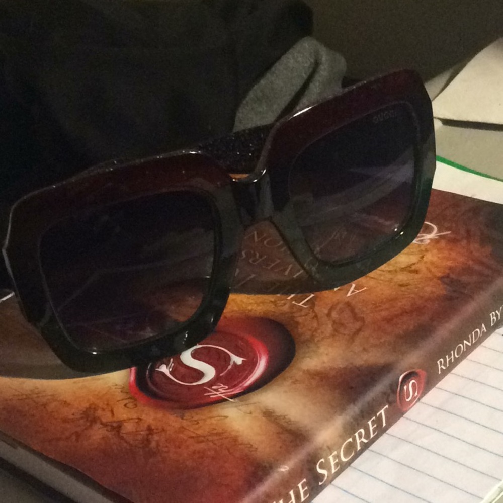 Gucci glasses.  Men.